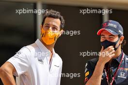 (L to R): Daniel Ricciardo (AUS) McLaren with Sergio Perez (MEX) Red Bull Racing. 28.03.2021. Formula 1 World Championship, Rd 1, Bahrain Grand Prix, Sakhir, Bahrain, Race Day.