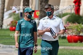 (L to R): Sebastian Vettel (GER) Aston Martin F1 Team with Andy Stevenson (GBR) Aston Martin F1 Team Manager. 28.03.2021. Formula 1 World Championship, Rd 1, Bahrain Grand Prix, Sakhir, Bahrain, Race Day.