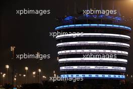 Circuit atmosphere - illuminated building. 25.03.2021. Formula 1 World Championship, Rd 1, Bahrain Grand Prix, Sakhir, Bahrain, Preparation Day.