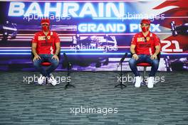(L to R): Carlos Sainz Jr (ESP) Ferrari and Charles Leclerc (MON) Ferrari in the FIA Press Conference. 25.03.2021. Formula 1 World Championship, Rd 1, Bahrain Grand Prix, Sakhir, Bahrain, Preparation Day.