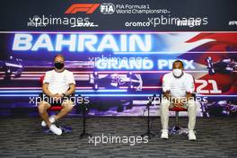 (L to R): Valtteri Bottas (FIN) Mercedes AMG F1 and team mate Lewis Hamilton (GBR) Mercedes AMG F1 in the FIA Press Conference. 25.03.2021. Formula 1 World Championship, Rd 1, Bahrain Grand Prix, Sakhir, Bahrain, Preparation Day.