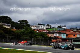 Charles Leclerc (MON) Ferrari SF-21 leads Sebastian Vettel (GER) Aston Martin F1 Team AMR21. 12.11.2021. Formula 1 World Championship, Rd 19, Brazilian Grand Prix, Sao Paulo, Brazil, Qualifying Day.
