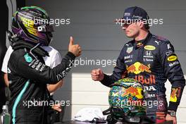 (L to R): race winner Lewis Hamilton (GBR) Mercedes AMG F1 celebrates with second placed Max Verstappen (NLD) Red Bull Racing in parc ferme. 14.11.2021. Formula 1 World Championship, Rd 19, Brazilian Grand Prix, Sao Paulo, Brazil, Race Day.