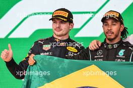 (L to R): Second placed Max Verstappen (NLD) Red Bull Racing celebrates on the podium with race winner Lewis Hamilton (GBR) Mercedes AMG F1. 14.11.2021. Formula 1 World Championship, Rd 19, Brazilian Grand Prix, Sao Paulo, Brazil, Race Day.