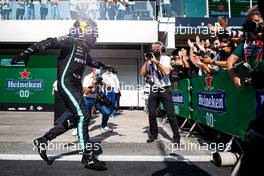 Race winner Lewis Hamilton (GBR) Mercedes AMG F1 celebrates with the team in parc ferme. 14.11.2021. Formula 1 World Championship, Rd 19, Brazilian Grand Prix, Sao Paulo, Brazil, Race Day.