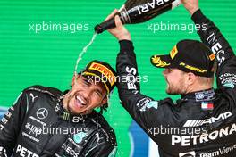 Race winner Lewis Hamilton (GBR) Mercedes AMG F1 celebrates on the podium With third placed team mate Valtteri Bottas (FIN) Mercedes AMG F1. 14.11.2021. Formula 1 World Championship, Rd 19, Brazilian Grand Prix, Sao Paulo, Brazil, Race Day.