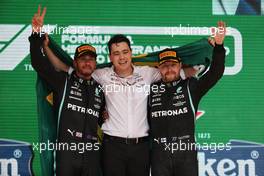 1st place Lewis Hamilton (GBR) Mercedes AMG F1 W12 with  3rd place Valtteri Bottas (FIN) Mercedes AMG F1 and Leonardo Donisete da Silva (BRA) Mercedes AMG F1 Team Strategy Engineer. 14.11.2021. Formula 1 World Championship, Rd 19, Brazilian Grand Prix, Sao Paulo, Brazil, Race Day.
