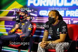Lewis Hamilton (GBR) Mercedes AMG F1 and Max Verstappen (NLD) Red Bull Racing in the post race FIA Press Conference. 14.11.2021. Formula 1 World Championship, Rd 19, Brazilian Grand Prix, Sao Paulo, Brazil, Race Day.