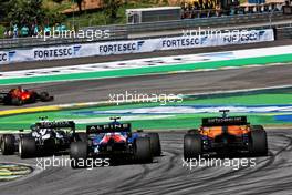 Esteban Ocon (FRA) Alpine F1 Team A521 and Daniel Ricciardo (AUS) McLaren MCL35M battle for position. 14.11.2021. Formula 1 World Championship, Rd 19, Brazilian Grand Prix, Sao Paulo, Brazil, Race Day.