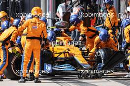 Lando Norris (GBR) McLaren MCL35M makes a pit stop. 14.11.2021. Formula 1 World Championship, Rd 19, Brazilian Grand Prix, Sao Paulo, Brazil, Race Day.