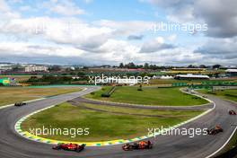 Carlos Sainz Jr (ESP) Ferrari SF-21 leads Max Verstappen (NLD) Red Bull Racing RB16B during Sprint. 13.11.2021. Formula 1 World Championship, Rd 19, Brazilian Grand Prix, Sao Paulo, Brazil, Sprint Race Day.
