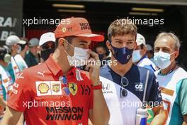 (L to R): Carlos Sainz Jr (ESP) Ferrari and Charles Leclerc (MON) Ferrari on the drivers parade. 14.11.2021. Formula 1 World Championship, Rd 19, Brazilian Grand Prix, Sao Paulo, Brazil, Race Day.