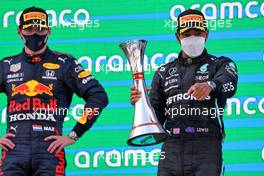 Race winner Lewis Hamilton (GBR) Mercedes AMG F1 celebrates on the podium with Max Verstappen (NLD) Red Bull Racing (Left). 09.05.2021. Formula 1 World Championship, Rd 4, Spanish Grand Prix, Barcelona, Spain, Race Day.