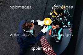 Race winner Lewis Hamilton (GBR) Mercedes AMG F1 celebrates on the podium with Alex Molina, FOM. 09.05.2021. Formula 1 World Championship, Rd 4, Spanish Grand Prix, Barcelona, Spain, Race Day.