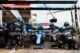 Fernando Alonso (ESP) Alpine F1 Team A521 makes a pit stop. 09.05.2021. Formula 1 World Championship, Rd 4, Spanish Grand Prix, Barcelona, Spain, Race Day.