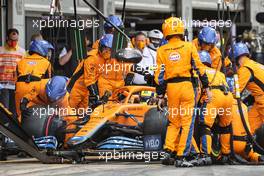 Lando Norris (GBR) McLaren MCL35M makes a pit stop. 09.05.2021. Formula 1 World Championship, Rd 4, Spanish Grand Prix, Barcelona, Spain, Race Day.