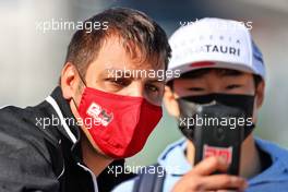 Yuki Tsunoda (JPN) AlphaTauri with a fan. 08.05.2021. Formula 1 World Championship, Rd 4, Spanish Grand Prix, Barcelona, Spain, Qualifying Day.