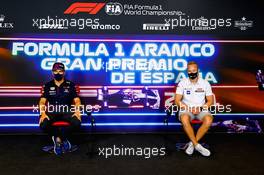 (L to R): Sergio Perez (MEX) Red Bull Racing and Nikita Mazepin (RUS) Haas F1 Team in the FIA Press Conference. 06.05.2021. Formula 1 World Championship, Rd 4, Spanish Grand Prix, Barcelona, Spain, Preparation Day.