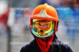 Lando Norris (GBR) McLaren MCL35M reflected in a fire marshal's helmet visor. 18.06.2021. Formula 1 World Championship, Rd 7, French Grand Prix, Paul Ricard, France, Practice Day.