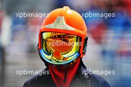 Fernando Alonso (ESP) Alpine F1 Team A521 reflected in a fire marshal's helmet visor. 18.06.2021. Formula 1 World Championship, Rd 7, French Grand Prix, Paul Ricard, France, Practice Day.