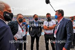 Marcin Budkowski (POL) Alpine F1 Team Executive Director and Eric Boullier (FRA) French Grand Prix Managing Director with guests on the grid. 20.06.2021. Formula 1 World Championship, Rd 7, French Grand Prix, Paul Ricard, France, Race Day.