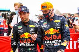 (L to R): Sergio Perez (MEX) Red Bull Racing with race winner Max Verstappen (NLD) Red Bull Racing in parc ferme. 20.06.2021. Formula 1 World Championship, Rd 7, French Grand Prix, Paul Ricard, France, Race Day.