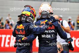 Race winner Max Verstappen (NLD) Red Bull Racing (Right)celebrates in parc ferme with third placed team mate Sergio Perez (MEX) Red Bull Racing. 20.06.2021. Formula 1 World Championship, Rd 7, French Grand Prix, Paul Ricard, France, Race Day.