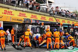 Lando Norris (GBR) McLaren MCL35M makes a pit stop. 20.06.2021. Formula 1 World Championship, Rd 7, French Grand Prix, Paul Ricard, France, Race Day.