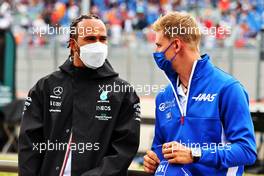 (L to R): Lewis Hamilton (GBR) Mercedes AMG F1 and Mick Schumacher (GER) Haas F1 Team on the drivers parade. 20.06.2021. Formula 1 World Championship, Rd 7, French Grand Prix, Paul Ricard, France, Race Day.