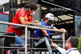 (L to R): Carlos Sainz Jr (ESP) Ferrari with Fernando Alonso (ESP) Alpine F1 Team and Eric Boullier (FRA) French Grand Prix Managing Director. 17.06.2021. Formula 1 World Championship, Rd 7, French Grand Prix, Paul Ricard, France, Preparation Day.