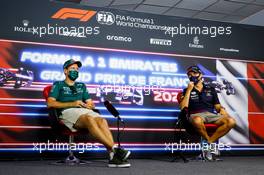(L to R): Sebastian Vettel (GER) Aston Martin F1 Team with Sergio Perez (MEX) Red Bull Racing in the FIA Press Conference. 17.06.2021. Formula 1 World Championship, Rd 7, French Grand Prix, Paul Ricard, France, Preparation Day.