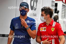 (L to R): George Russell (GBR) Williams Racing with Charles Leclerc (MON) Ferrari. 17.06.2021. Formula 1 World Championship, Rd 7, French Grand Prix, Paul Ricard, France, Preparation Day.