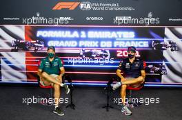 (L to R): Sebastian Vettel (GER) Aston Martin F1 Team with Sergio Perez (MEX) Red Bull Racing in the FIA Press Conference. 17.06.2021. Formula 1 World Championship, Rd 7, French Grand Prix, Paul Ricard, France, Preparation Day.