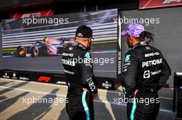 (L to R): Valtteri Bottas (FIN) Mercedes AMG F1 with team mate Lewis Hamilton (GBR) Mercedes AMG F1 in qualifying parc ferme. 16.07.2021. Formula 1 World Championship, Rd 10, British Grand Prix, Silverstone, England, Practice Day.