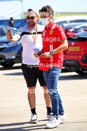 Charles Leclerc (MON) Ferrari with fan. 16.07.2021. Formula 1 World Championship, Rd 10, British Grand Prix, Silverstone, England, Practice Day.
