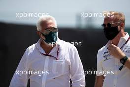 (L to R): Lawrence Stroll (CDN) Aston Martin F1 Team Investor with Marek Reichman (GBR) Aston Martin Chief Creative Officer. 16.07.2021. Formula 1 World Championship, Rd 10, British Grand Prix, Silverstone, England, Practice Day.
