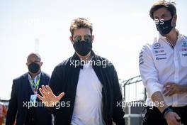 (L to R): Tom Cruise (USA) Actor with Toto Wolff (GER) Mercedes AMG F1 Shareholder and Executive Director. 18.07.2021. Formula 1 World Championship, Rd 10, British Grand Prix, Silverstone, England, Race Day.