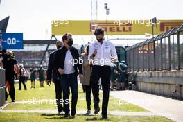 (L to R): Tom Cruise (USA) Actor with Toto Wolff (GER) Mercedes AMG F1 Shareholder and Executive Director. 18.07.2021. Formula 1 World Championship, Rd 10, British Grand Prix, Silverstone, England, Race Day.