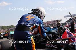 Lando Norris (GBR) McLaren and Lewis Hamilton (GBR) Mercedes AMG F1. 18.07.2021. Formula 1 World Championship, Rd 10, British Grand Prix, Silverstone, England, Race Day.