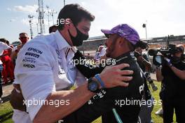 Race winner Lewis Hamilton (GBR) Mercedes AMG F1 celebrates at the end of the race with Toto Wolff (GER) Mercedes AMG F1 Shareholder and Executive Director. 18.07.2021. Formula 1 World Championship, Rd 10, British Grand Prix, Silverstone, England, Race Day.