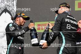 1st place Lewis Hamilton (GBR) Mercedes AMG F1 with 3rd place Valtteri Bottas (FIN) Mercedes AMG F1 W12. 18.07.2021. Formula 1 World Championship, Rd 10, British Grand Prix, Silverstone, England, Race Day.