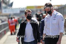(L to R): Tom Cruise (USA) Actor, with Toto Wolff (GER) Mercedes AMG F1 Shareholder and Executive Director. 18.07.2021. Formula 1 World Championship, Rd 10, British Grand Prix, Silverstone, England, Race Day.