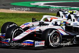 Nikita Mazepin (RUS) Haas F1 Team VF-21 and team mate Mick Schumacher (GER) Haas VF-21 battle for position. 18.07.2021. Formula 1 World Championship, Rd 10, British Grand Prix, Silverstone, England, Race Day.