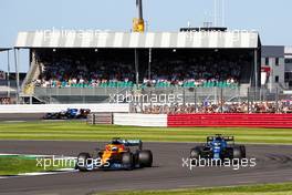 Daniel Ricciardo (AUS) McLaren MCL35M and Fernando Alonso (ESP) Alpine F1 Team A521 battle for position. 17.07.2021. Formula 1 World Championship, Rd 10, British Grand Prix, Silverstone, England, Qualifying Day.