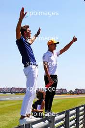 George Russell (GBR) Williams Racing and Lando Norris (GBR) McLaren on the drivers parade. 18.07.2021. Formula 1 World Championship, Rd 10, British Grand Prix, Silverstone, England, Race Day.