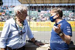 (L to R): Harrison Ford (USA) Actor with Jost Capito (GER) Williams Racing Chief Executive Officer. 18.07.2021. Formula 1 World Championship, Rd 10, British Grand Prix, Silverstone, England, Race Day.