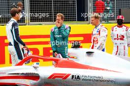 (L to R): George Russell (GBR) Williams Racing; Sebastian Vettel (GER) Aston Martin F1 Team; and Mick Schumacher (GER) Haas F1 Team - 2022 Car Launch. 15.07.2021. Formula 1 World Championship, Rd 10, British Grand Prix, Silverstone, England, Preparation Day.