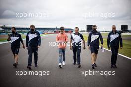 Pierre Gasly (FRA) AlphaTauri walks the circuit with the team. 15.07.2021. Formula 1 World Championship, Rd 10, British Grand Prix, Silverstone, England, Preparation Day.