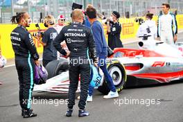 (L to R): Lewis Hamilton (GBR) Mercedes AMG F1 and team mate Valtteri Bottas (FIN) Mercedes AMG F1 - 2022 Car Launch. 15.07.2021. Formula 1 World Championship, Rd 10, British Grand Prix, Silverstone, England, Preparation Day.