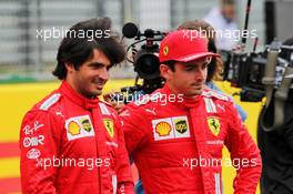(L to R): Carlos Sainz Jr (ESP) Ferrari and team mate Charles Leclerc (MON) Ferrari - 2022 Car Launch. 15.07.2021. Formula 1 World Championship, Rd 10, British Grand Prix, Silverstone, England, Preparation Day.